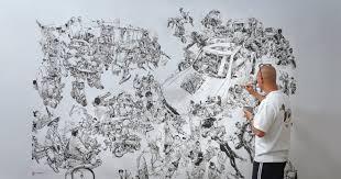 Kim jung gi devant sa fresque
